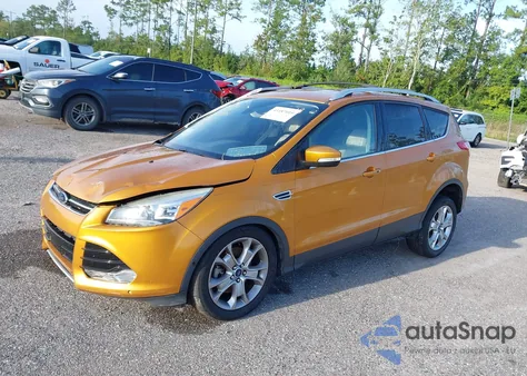 2016 Ford Escape Titanium z USA, uszkodzony, nr VIN 1FMCU0J97GUB31326